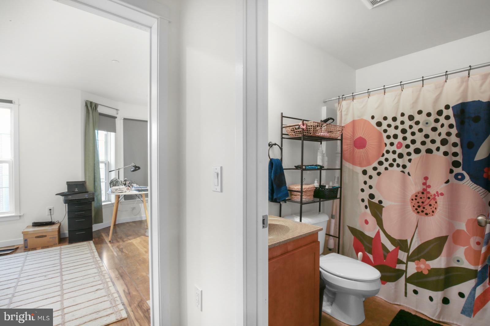 134 South 46th Street, Unit C Philadelphia, PA 19139 - Photo 10 of 17 a bathroom with a sink toilet and shower