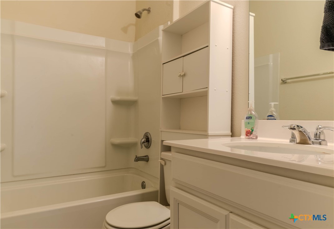 620 English Oak Street Georgetown, TX 78626 - Photo 11 of 29 a bathroom with a sink toilet and shower