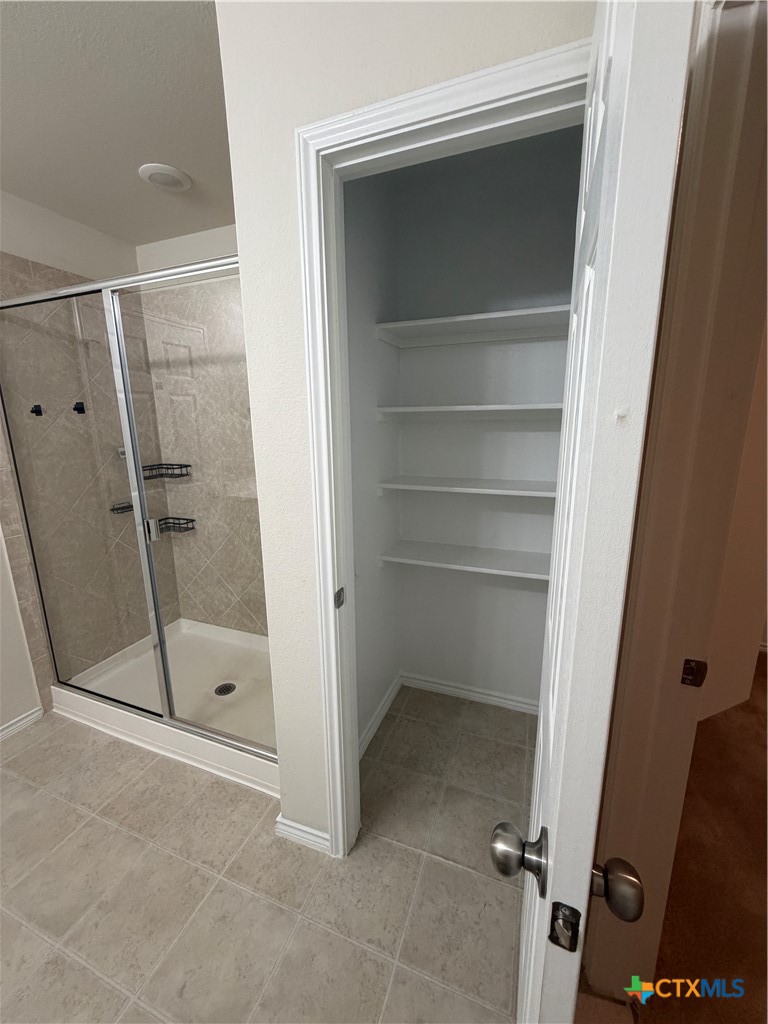620 English Oak Street Georgetown, TX 78626 - Photo 19 of 29 a bathroom with a shower and a sink