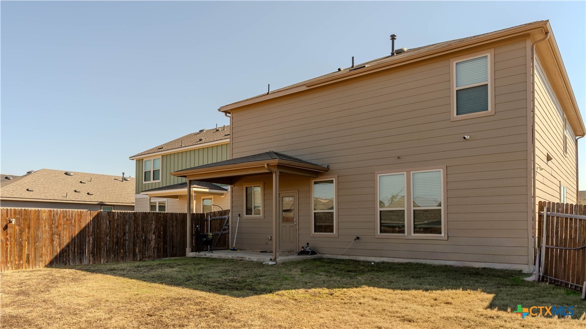 620 English Oak Street Georgetown, TX 78626 - Photo 28 of 29 a front view of a house with a yard