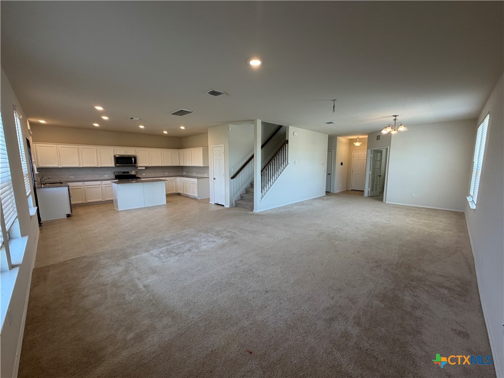 620 English Oak Street Georgetown, TX 78626 - Photo 4 of 29 a view of a hall and kitchen