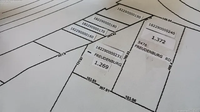 a view of a refrigerator in a kitchen