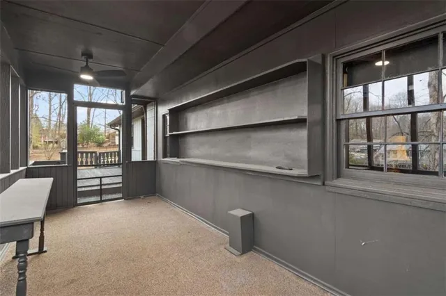a view of a house with a snow in the yard