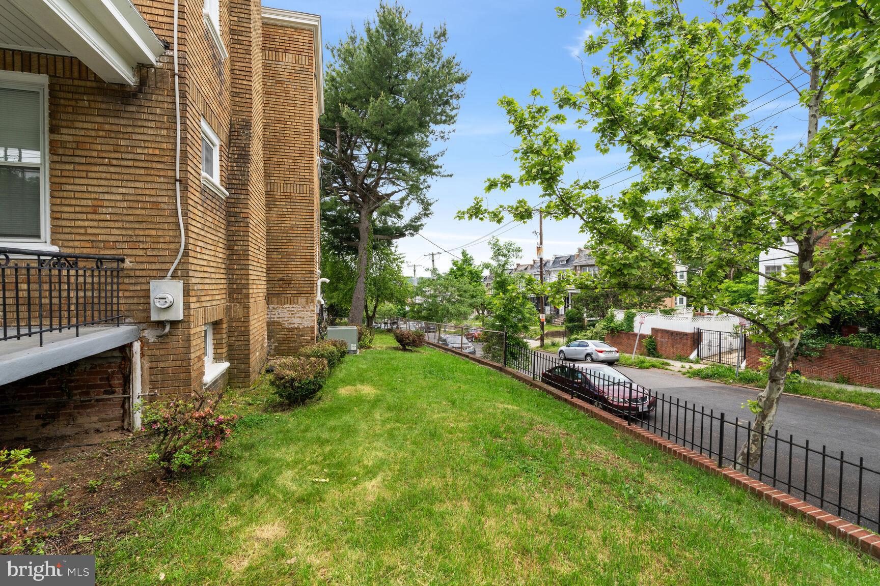 4528 4th Street Northwest Washington, DC 20011 - Photo 25 of 28 a view of a house with a yard and a garage