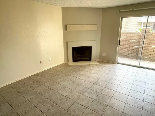 a kitchen with a stove and a refrigerator