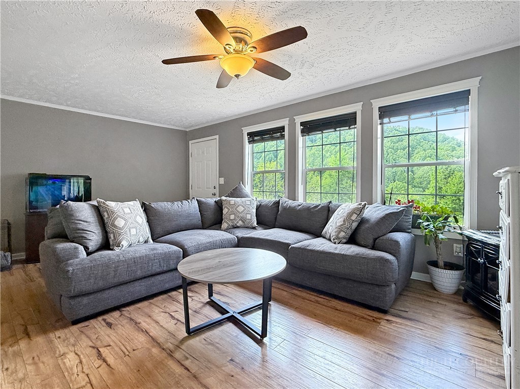 1173 Hopewell Church Road Boone, NC 28607 - Photo 11 of 39 a living room with furniture and a large window