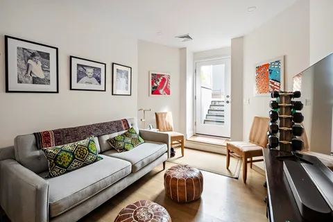 a living room with furniture and a couch