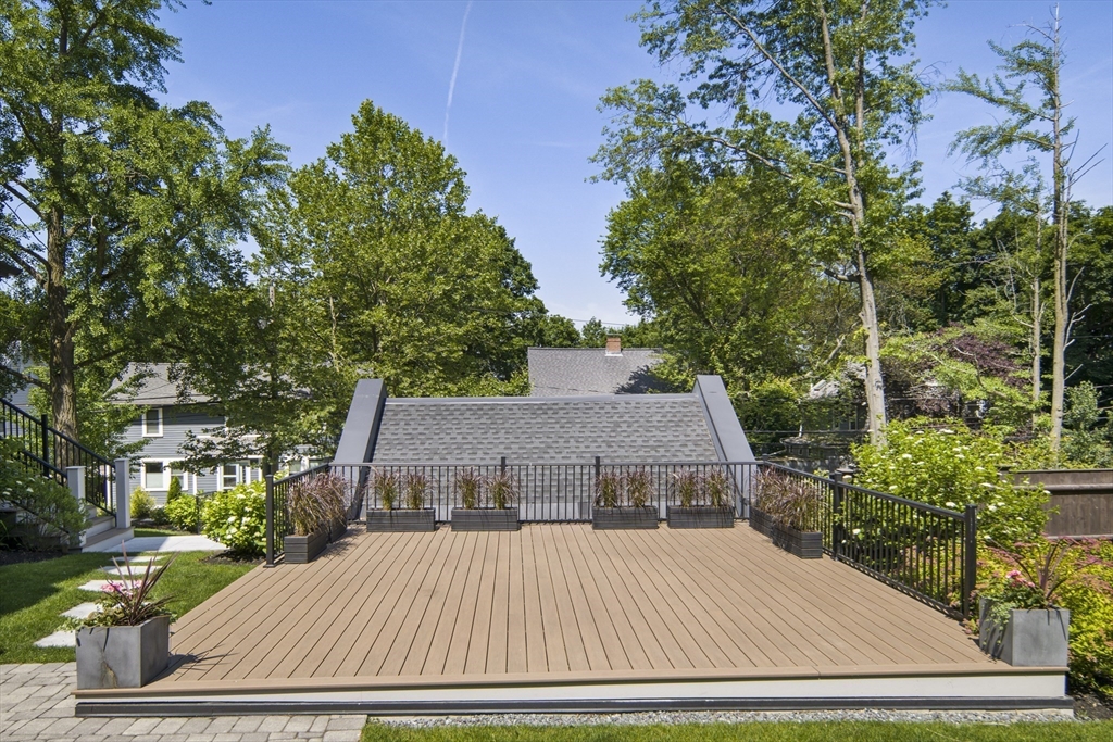 186 Mason Terrace, Unit 186 Brookline, MA 02446 - Photo 24 of 27 front view of a house with a yard