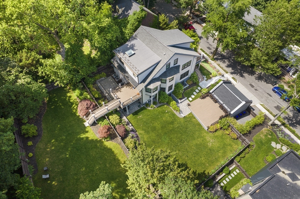 186 Mason Terrace, Unit 186 Brookline, MA 02446 - Photo 25 of 27 an aerial view of a house with a garden