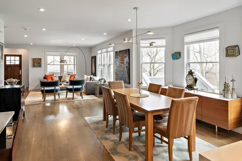 a view of a dining room with furniture window and outside view