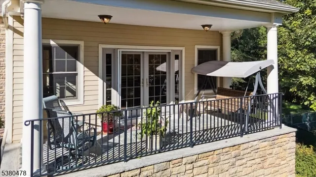 a spacious bedroom with a bed and a fireplace