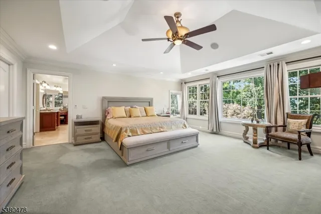 a large spacious bathroom with a large tub and sink