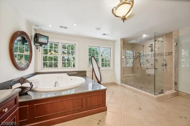 a bed room with a bed and a couch