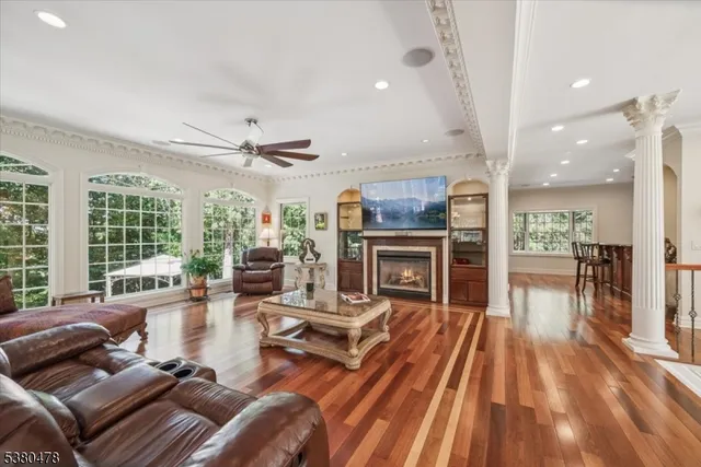 a living room with furniture and a fireplace