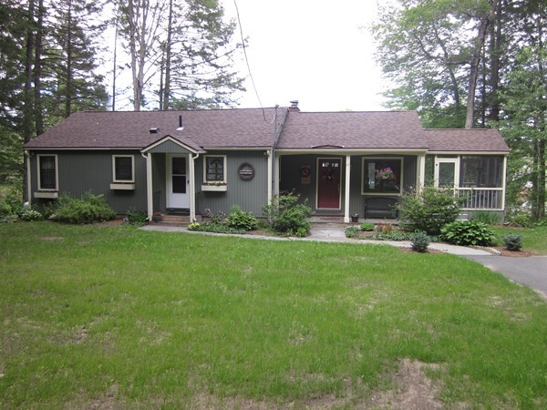 77 Intervale Road Orange, MA 01364 - Photo 2 of 28 a front view of a house with garden