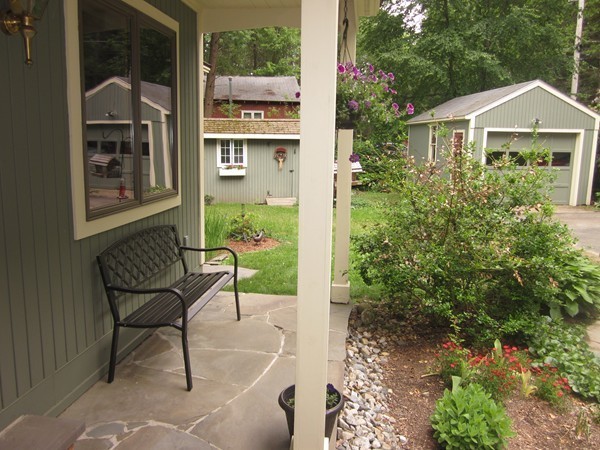 77 Intervale Road Orange, MA 01364 - Photo 3 of 28 a front view of a house with garden