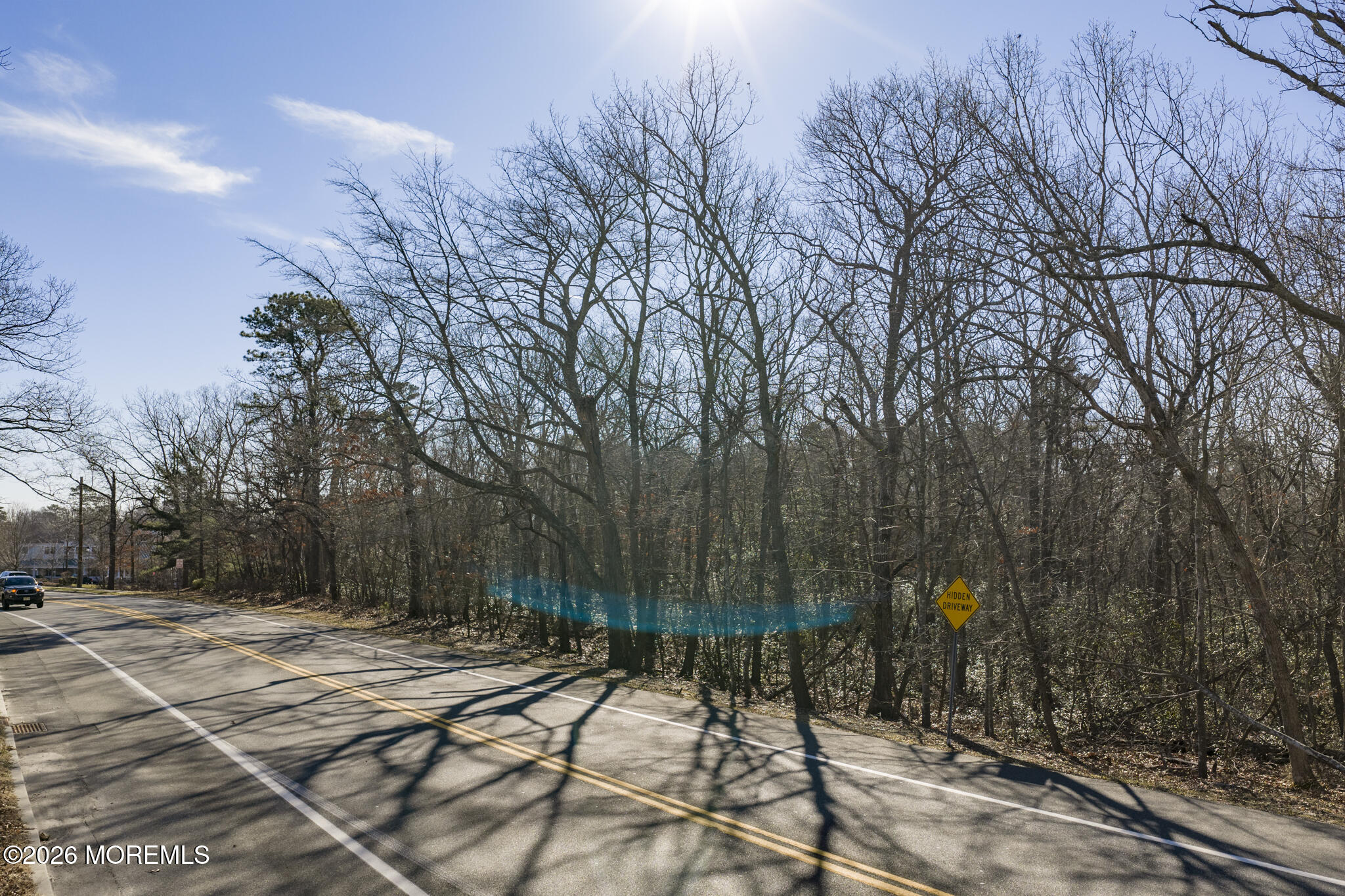 307 Mathistown Road Little Egg Harbor, NJ 08087 - Photo 22 of 25 a sign board with yard in the back