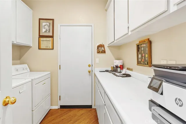 a view of living room with furniture and flat screen tv