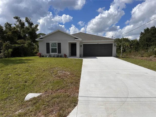 a front view of house with yard