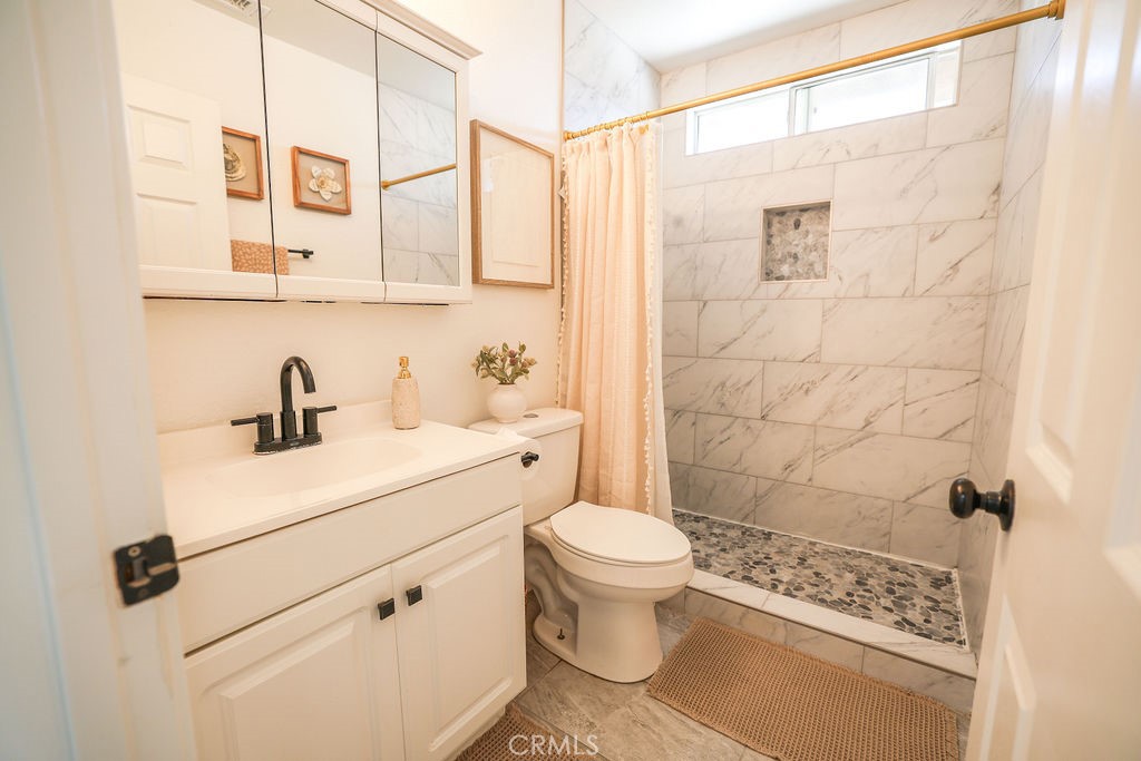16465 Holcomb Way Riverside, CA 92504 - Photo 28 of 49 Hall Bathroom/Remodeled