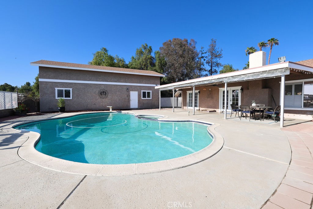 16465 Holcomb Way Riverside, CA 92504 - Photo 36 of 49 View of pool and side of RV garage