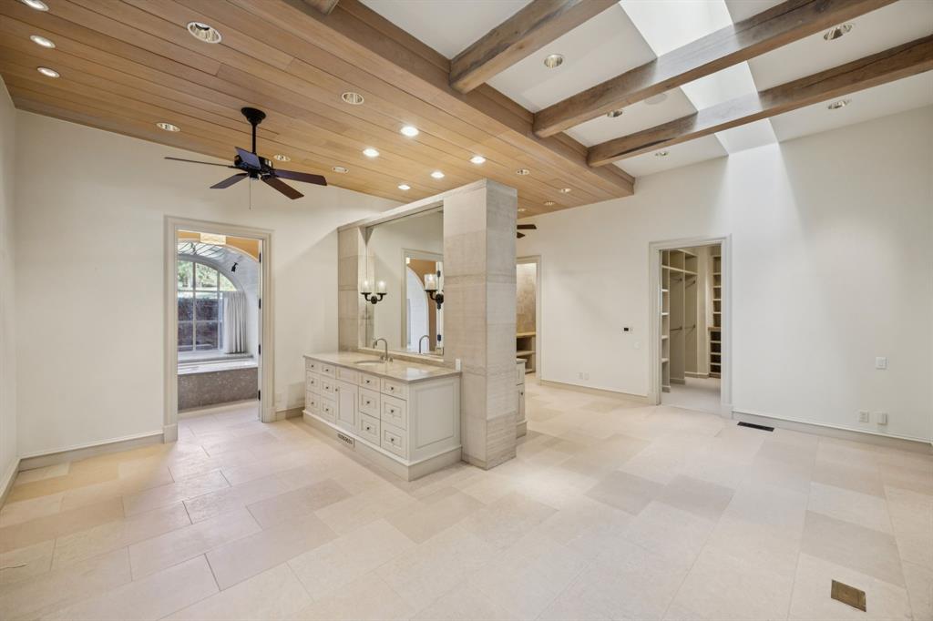 700 Jenkins Road Aledo, TX 76008 - Photo 20 of 40 an empty room with chandelier fan and kitchen view