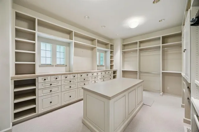 a bathroom with a sink double vanity and a bathtub