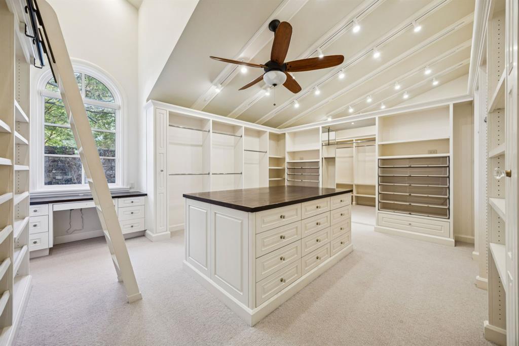 700 Jenkins Road Aledo, TX 76008 - Photo 23 of 40 a kitchen with white cabinets and white appliances