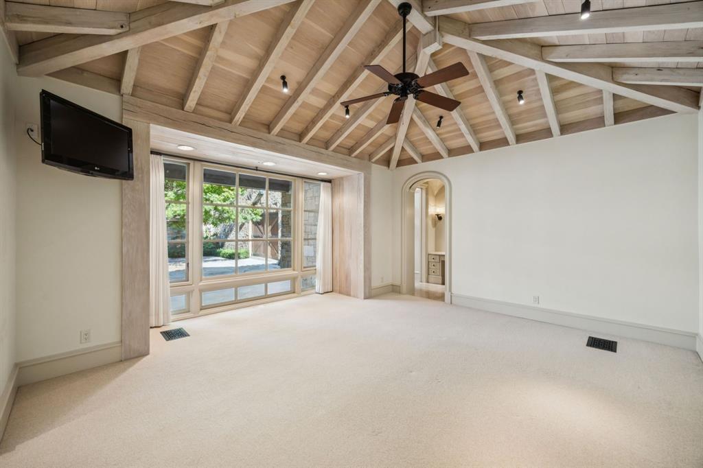 700 Jenkins Road Aledo, TX 76008 - Photo 24 of 40 a view of a livingroom with an empty space and a ceiling fan