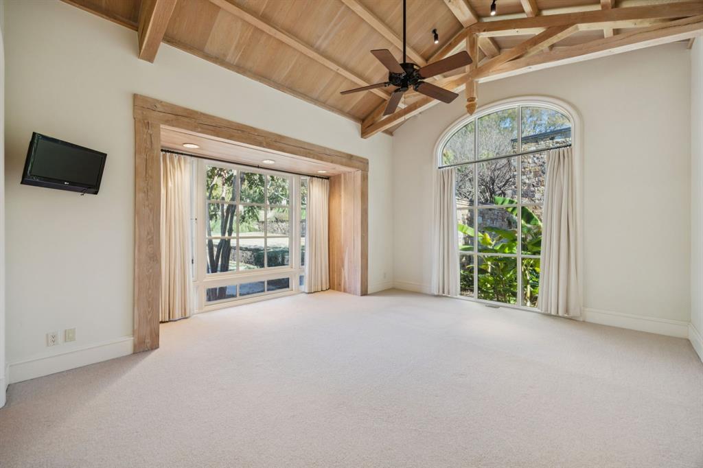 700 Jenkins Road Aledo, TX 76008 - Photo 26 of 40 a view of an empty room with a fireplace and a window