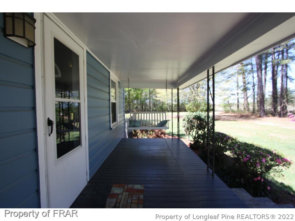 1063 Carl Freeman Road Stedman, NC 28391 - Photo 10 of 17 a view of outdoor space and deck