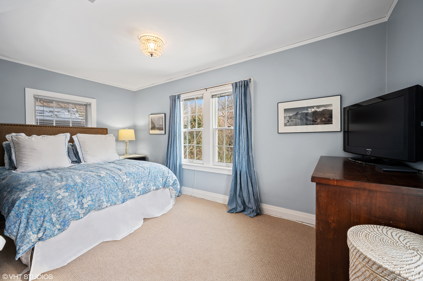 1928 Sunset Road Highland Park, IL 60035 - Photo 11 of 23 a bedroom with a bed and a flat screen tv