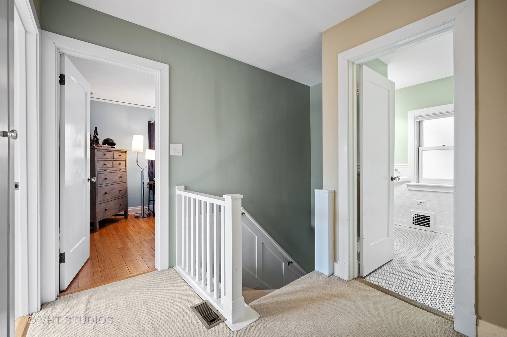 1928 Sunset Road Highland Park, IL 60035 - Photo 14 of 23 a view of a hallway with wooden floor and staircase