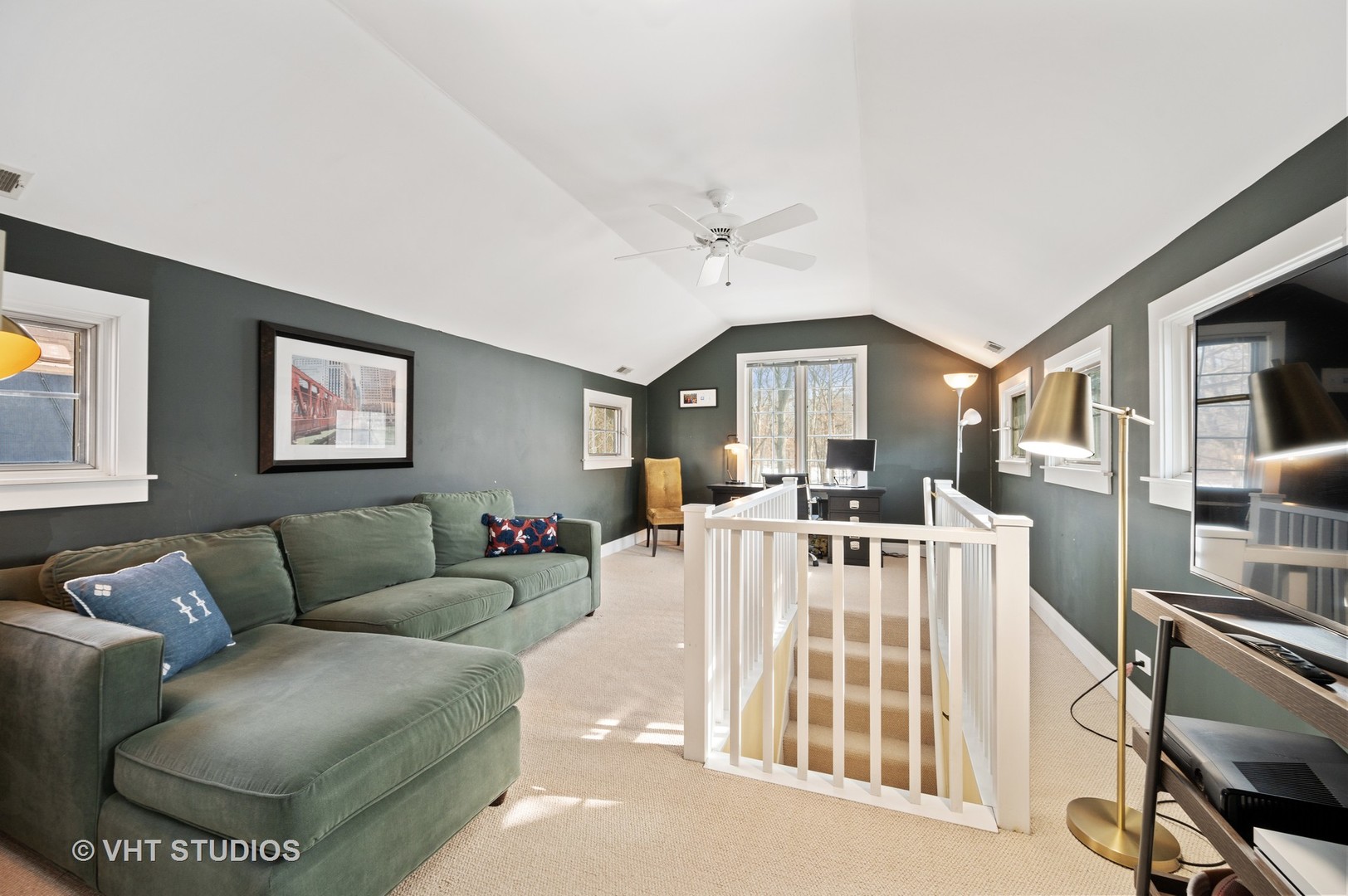 1928 Sunset Road Highland Park, IL 60035 - Photo 16 of 23 a living room with furniture a flat screen tv and a floor to ceiling window