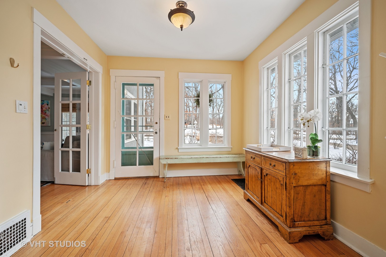 1928 Sunset Road Highland Park, IL 60035 - Photo 2 of 23 a view of a room with wooden floor and windows