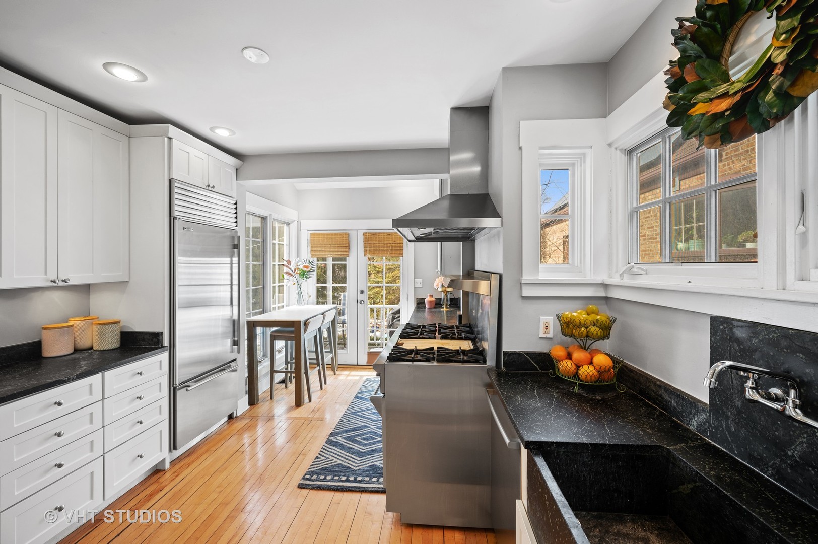 1928 Sunset Road Highland Park, IL 60035 - Photo 5 of 23 a kitchen that has a lot of cabinets a sink and appliances in it