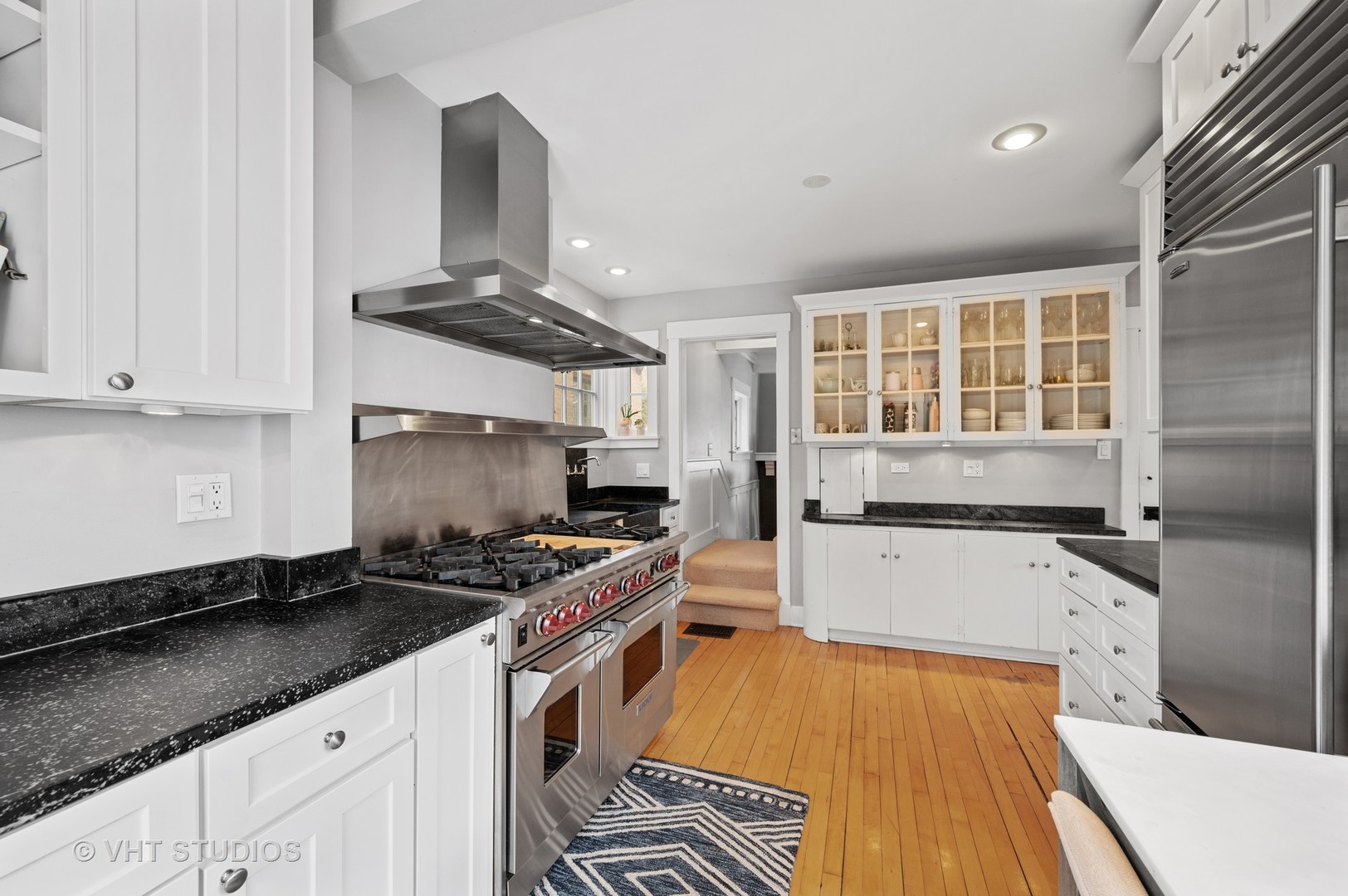 1928 Sunset Road Highland Park, IL 60035 - Photo 7 of 23 a kitchen with stainless steel appliances a stove a sink and a refrigerator