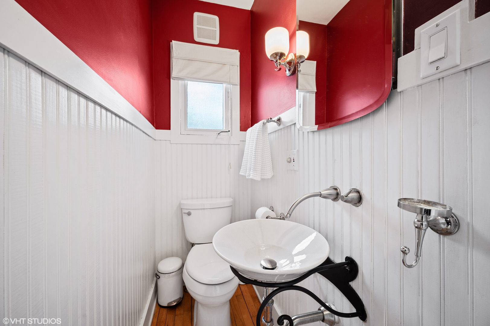 1928 Sunset Road Highland Park, IL 60035 - Photo 8 of 23 a bathroom with a toilet a sink and mirror