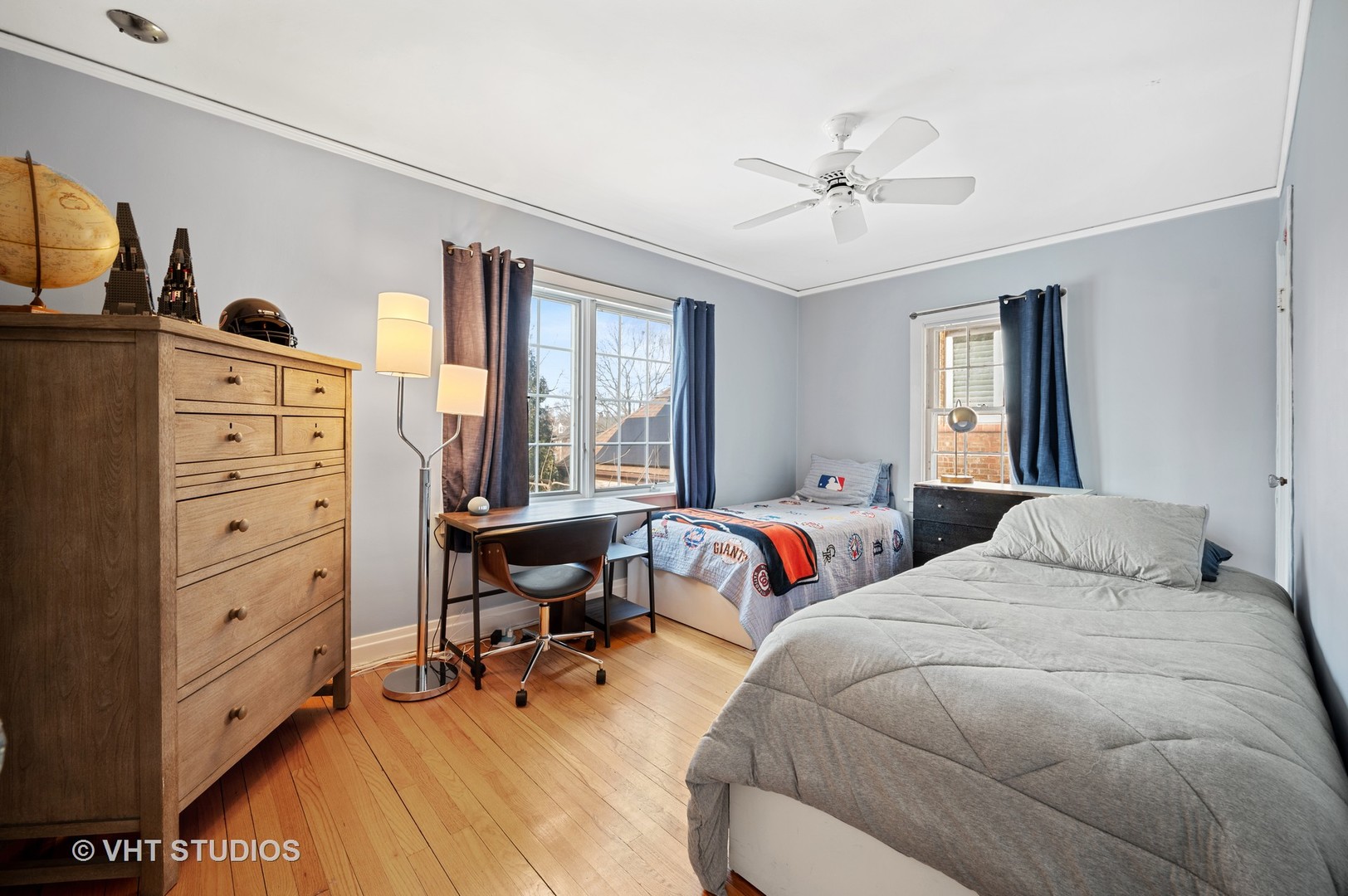 1928 Sunset Road Highland Park, IL 60035 - Photo 10 of 23 a bedroom with a bed and a chandelier