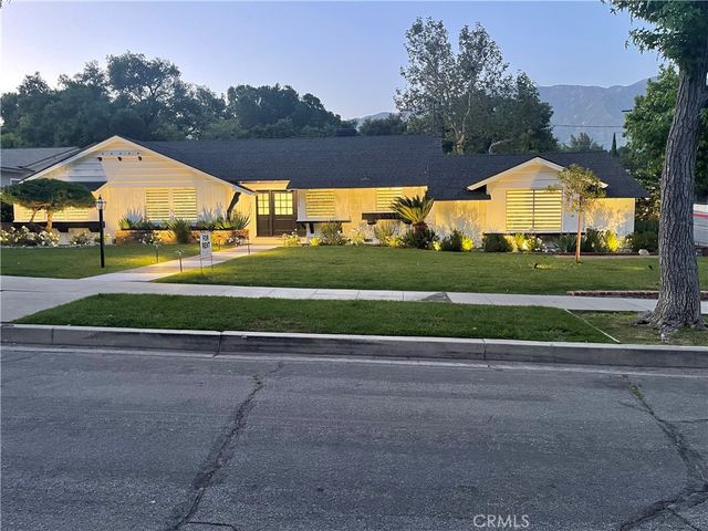 a view of street with houses