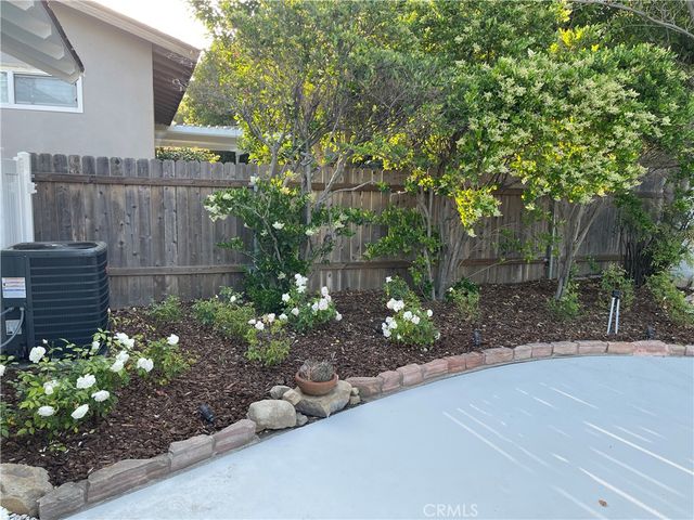 a view of a house with a swimming pool