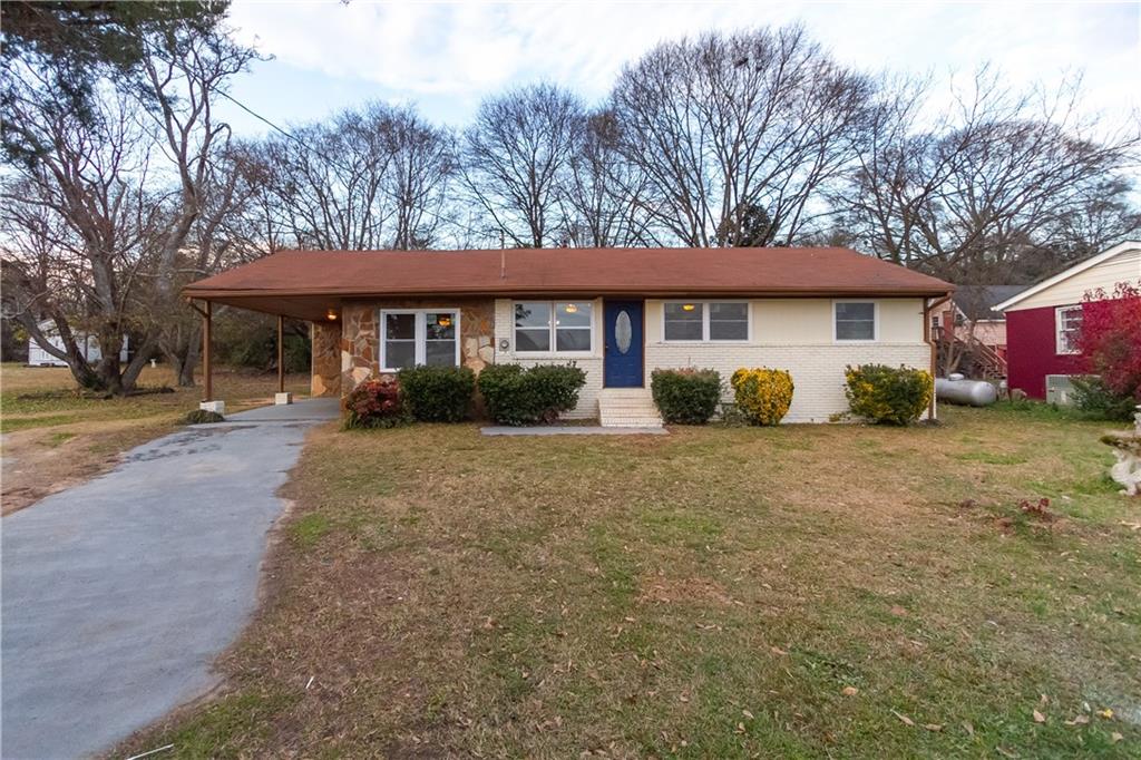 53 Lincoln Road McDonough, GA 30253 - Photo 1 of 1 a view of a house with a yard and plants