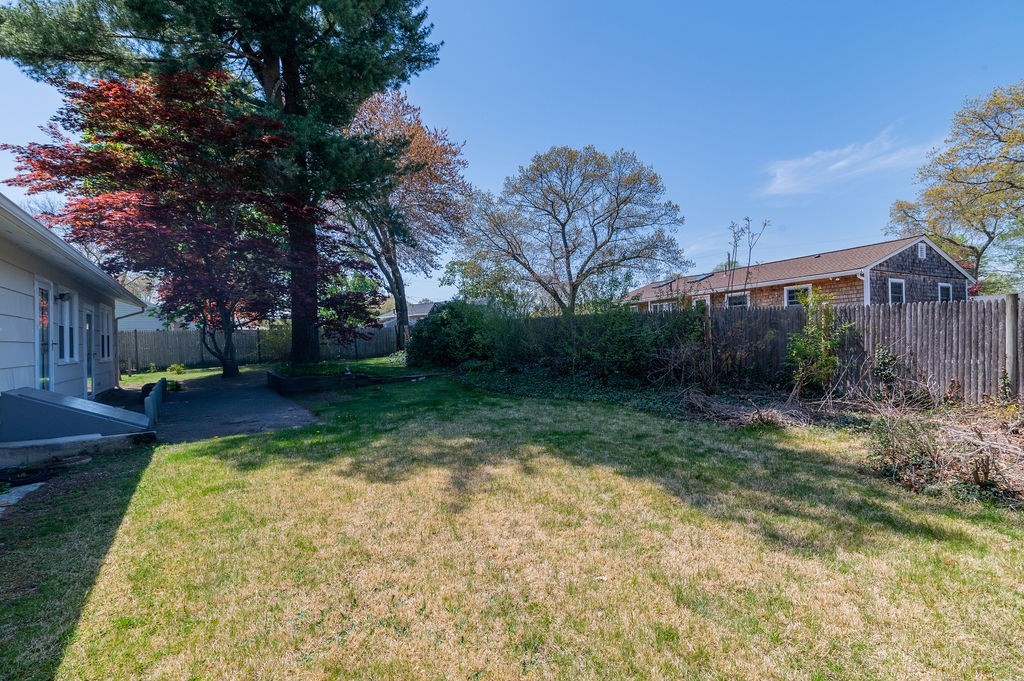 34 Clark Road Rockland, MA 02370 - Photo 23 of 37 a view of a backyard with a garden