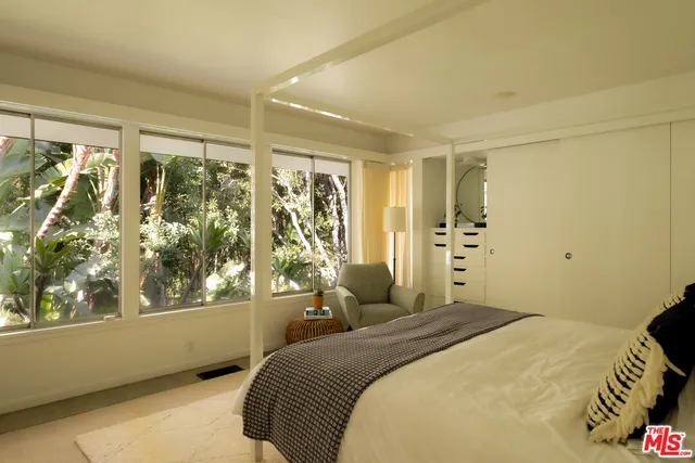 a bathroom with a sink double vanity and a mirror