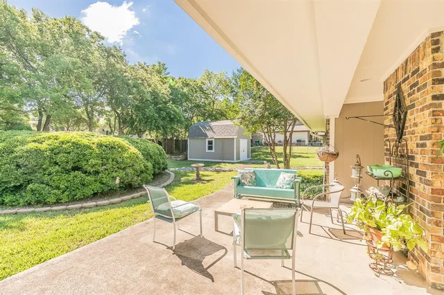 a view of a swimming pool with a lounge chairs