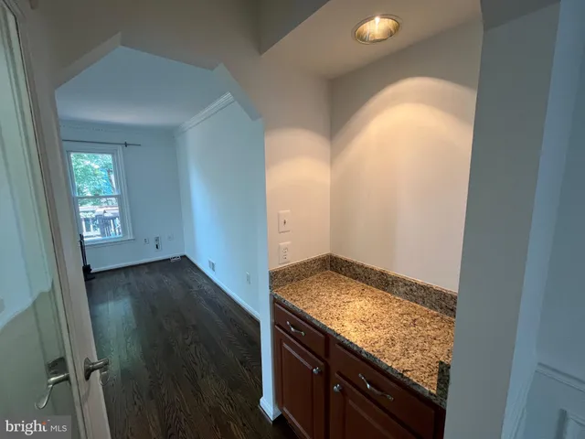 an empty room that has a window