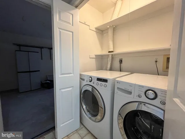 an empty room with fireplace