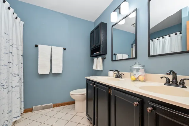a bathroom with a sink and a toilet