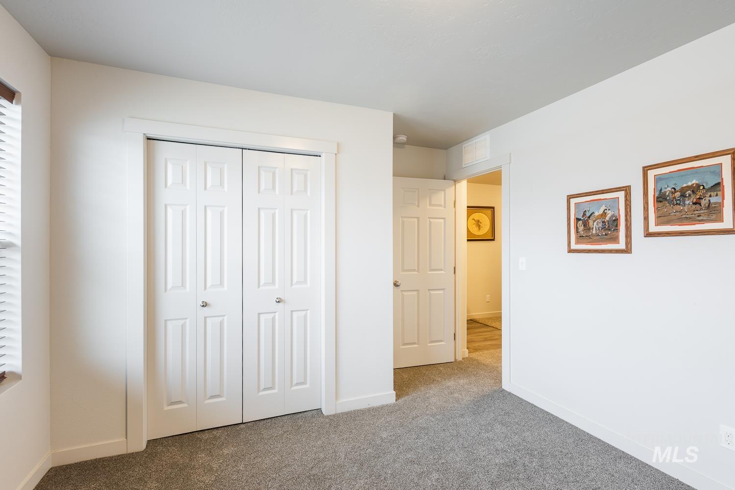 11309 West Viola Street Nampa, ID 83651 - Photo 28 of 37 Unfurnished bedroom with carpet flooring and a closet