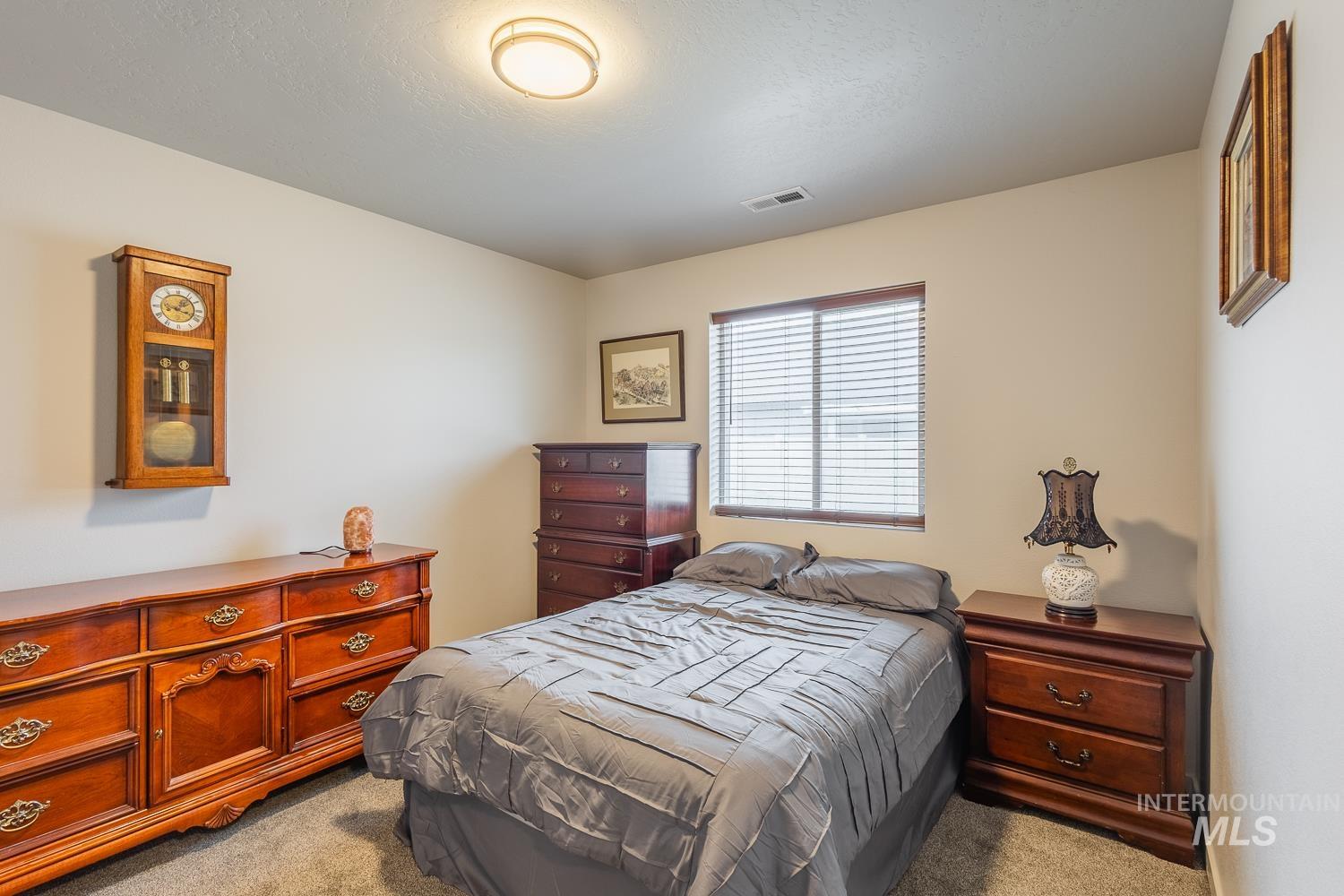 11309 West Viola Street Nampa, ID 83651 - Photo 31 of 37 Bedroom with carpet